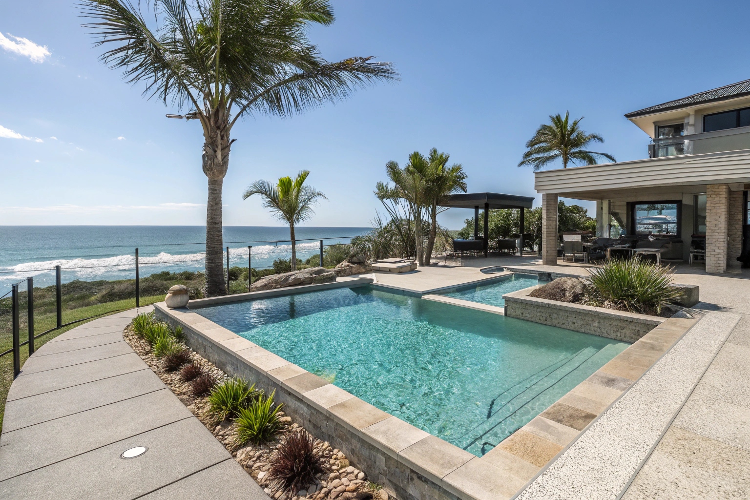 Resort-style concrete pool built for Newcastle's coastal climate and outdoor lifestyle